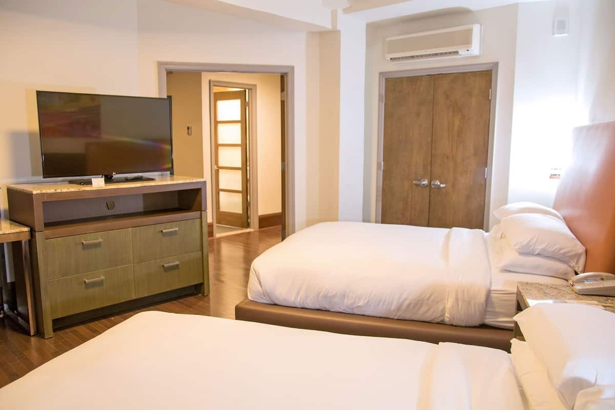 Hypo-allergenic bedding, down duvets, in-room safe