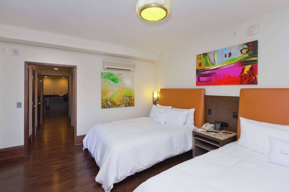 Hypo-allergenic bedding, down duvets, in-room safe