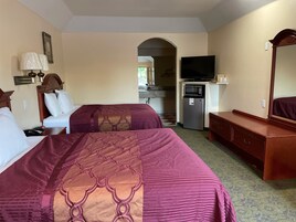 Tabla de planchar con plancha, wifi gratis, ropa de cama y despertador 