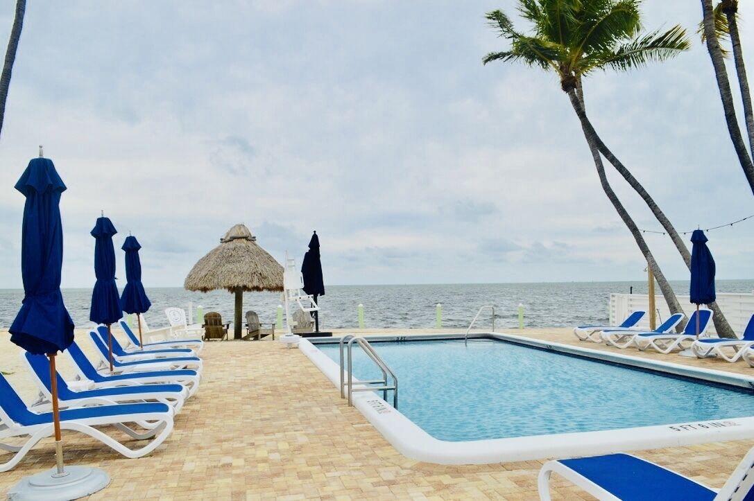 outdoor pool, open 7:30 am to 6:30 pm, pool loungers