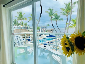 Oceanfront King Suite w/ Kitchen & Private Balcony | Water view at Drop Anchor
