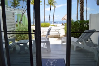 Oceanfront King Suite w/ Kitchen & Private Balcony | Terrace/patio at Drop Anchor