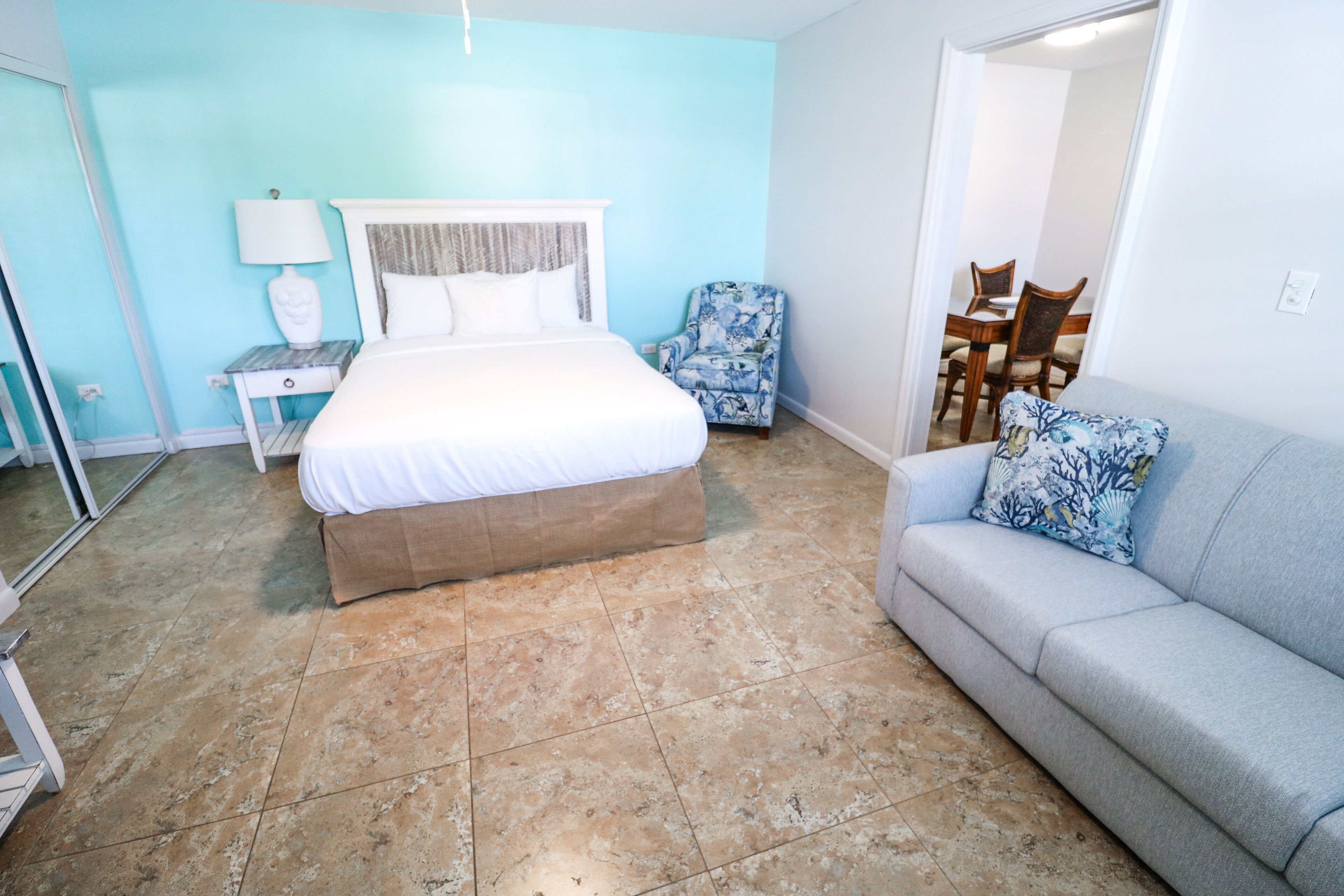 resort view queen family suite w/ kitchen | living area | flat-screen tv