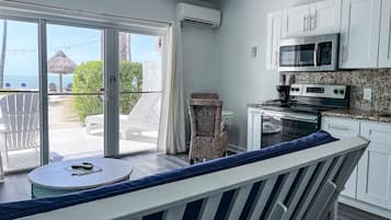 Premium-suite - 1 kingsize-seng - køkken - ved havet | Privat køkken | Kaffe-/temaskine