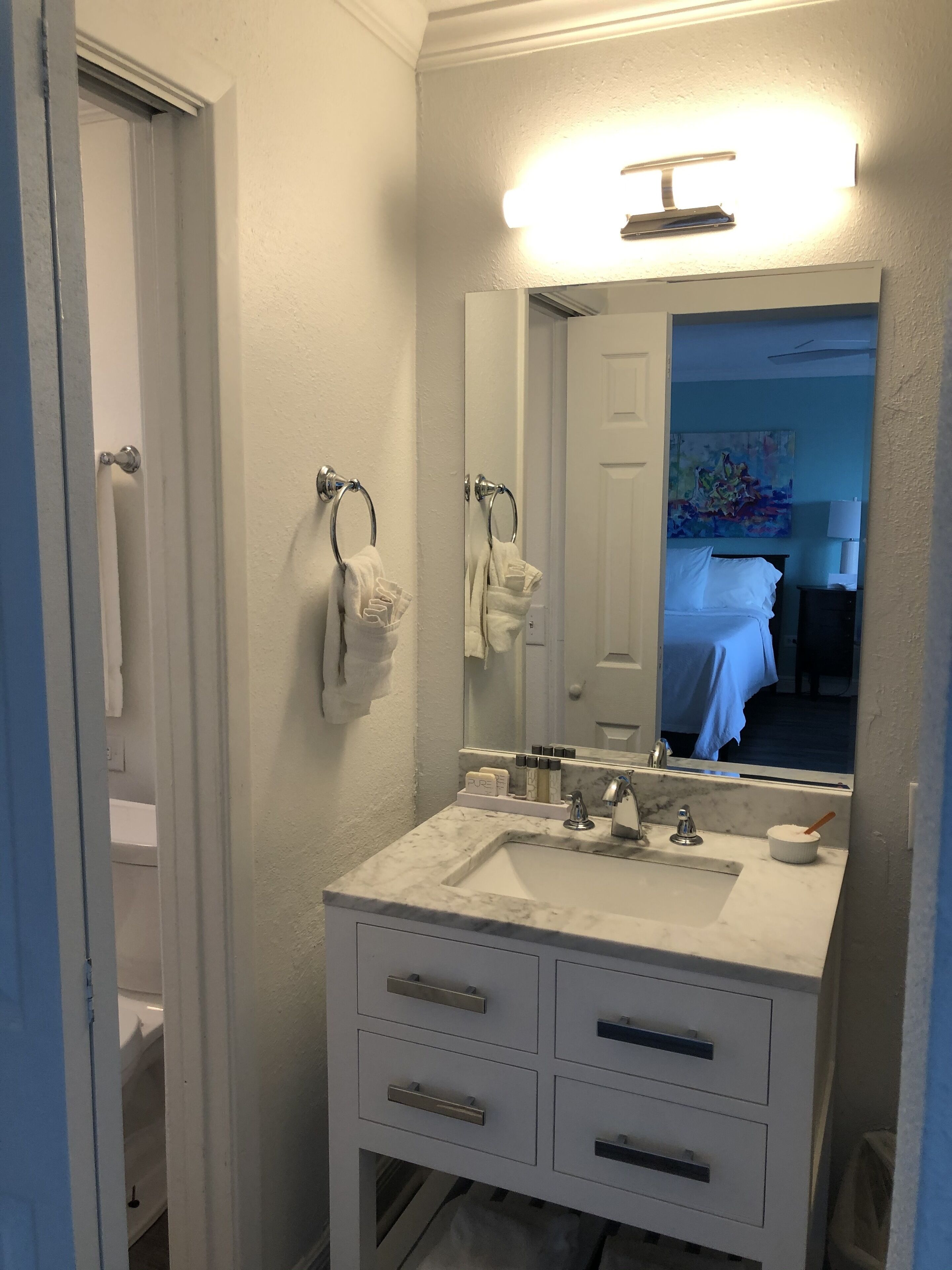 ocean view double queen room | bathroom | shower, free toiletries, hair dryer, towels