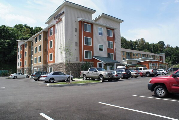 Experience the hotel's modern design, featuring a flat roof and expansive windows.