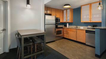 Suite, 2 Bedrooms | Private kitchen | Fridge, microwave, stovetop, dishwasher