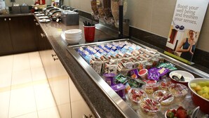 A buffet with various food items and beverages. - Residence Inn by Marriott Pittsburgh Monroeville/Wilkins (Pittsburgh)