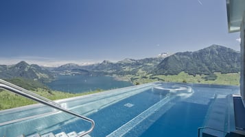 Outdoor pool, open 6:00 AM to 11:00 PM, pool umbrellas, sun loungers