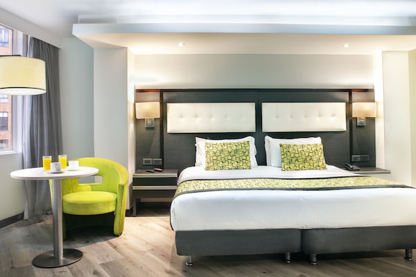 Superior Double Room | Minibar, in-room safe, desk, laptop workspace