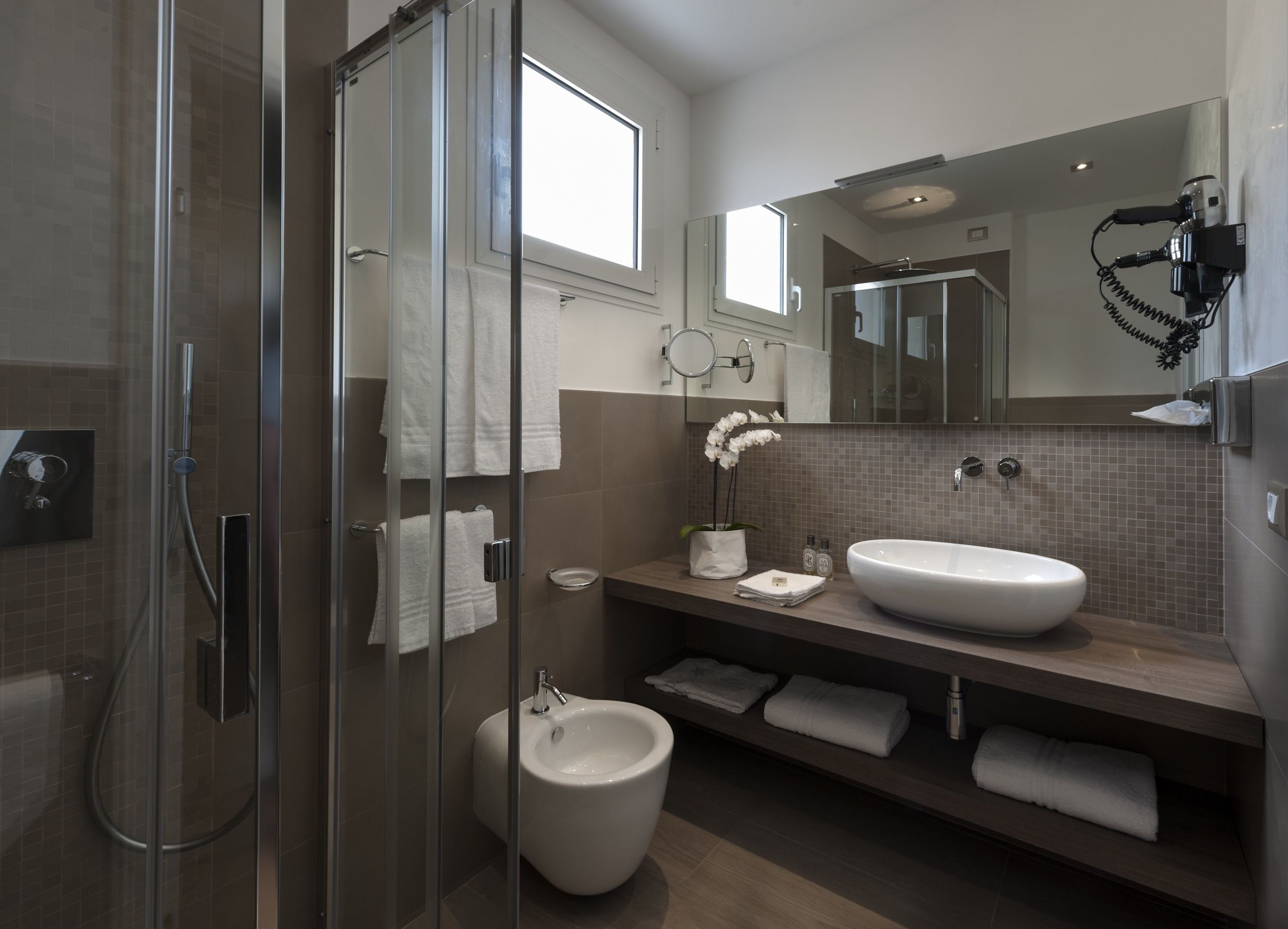 shower, free toiletries, hair dryer, slippers