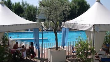 2 outdoor pools, open 9:30 AM to 7:30 PM, pool umbrellas, pool loungers