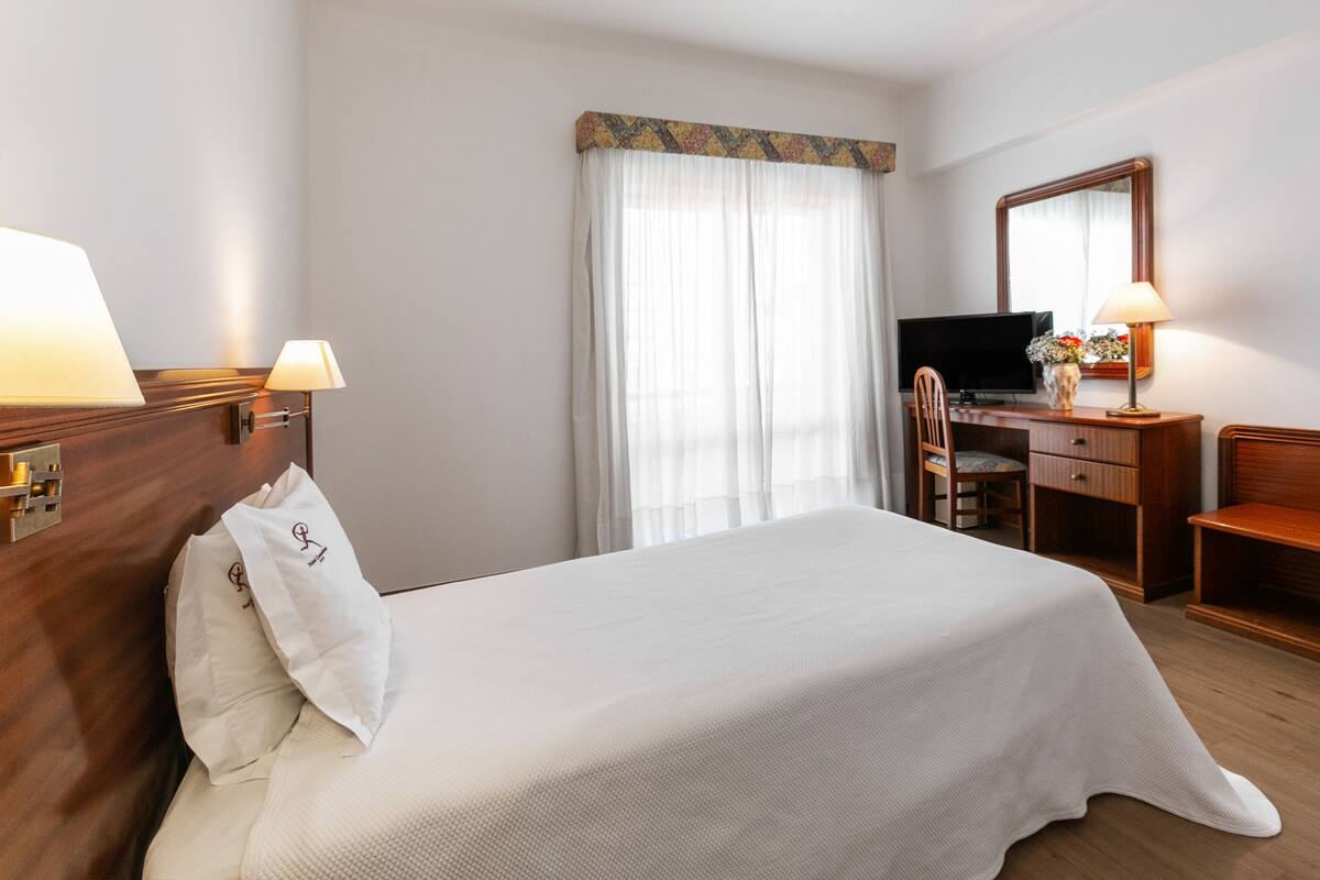 Desk, WiFi (free), bed sheets