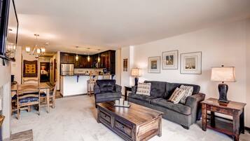 Premium Condo, 2 Bedrooms | Living area | 34-inch TV with cable channels, fireplace