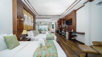 Deluxe Triple Room | Minibar, blackout curtains, iron/ironing board, free WiFi