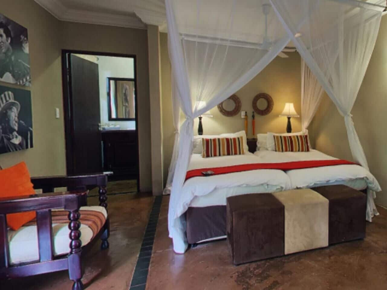 Habitación Deluxe doble | Caja fuerte, decoración individual, mobiliario individual y escritorio