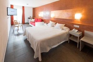 Ropa de cama de alta calidad y minibar