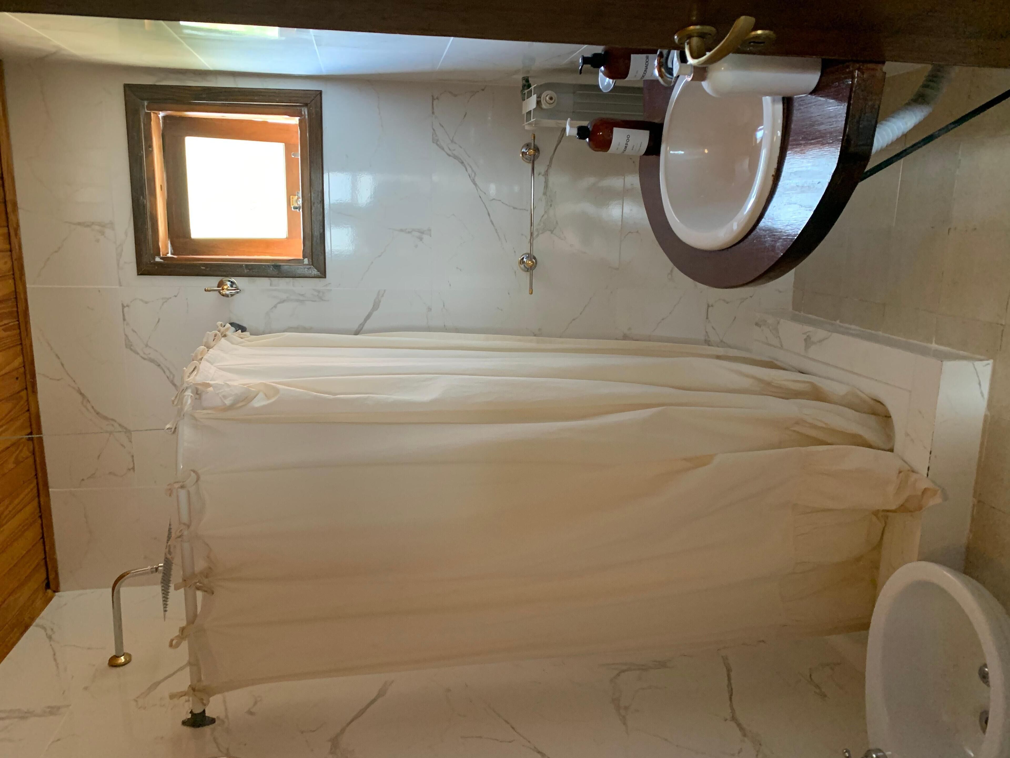 shower, free toiletries, towels