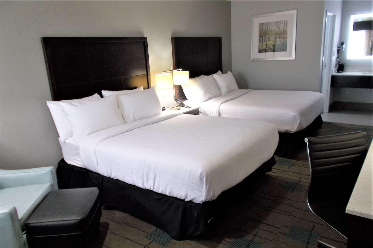 Down duvets, pillow-top beds, desk, laptop workspace