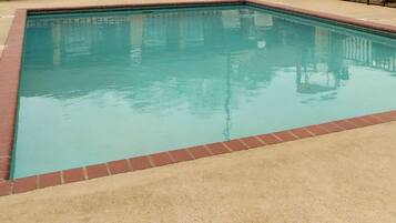 Seasonal outdoor pool, open 7:00 AM to 9:00 PM, sun loungers