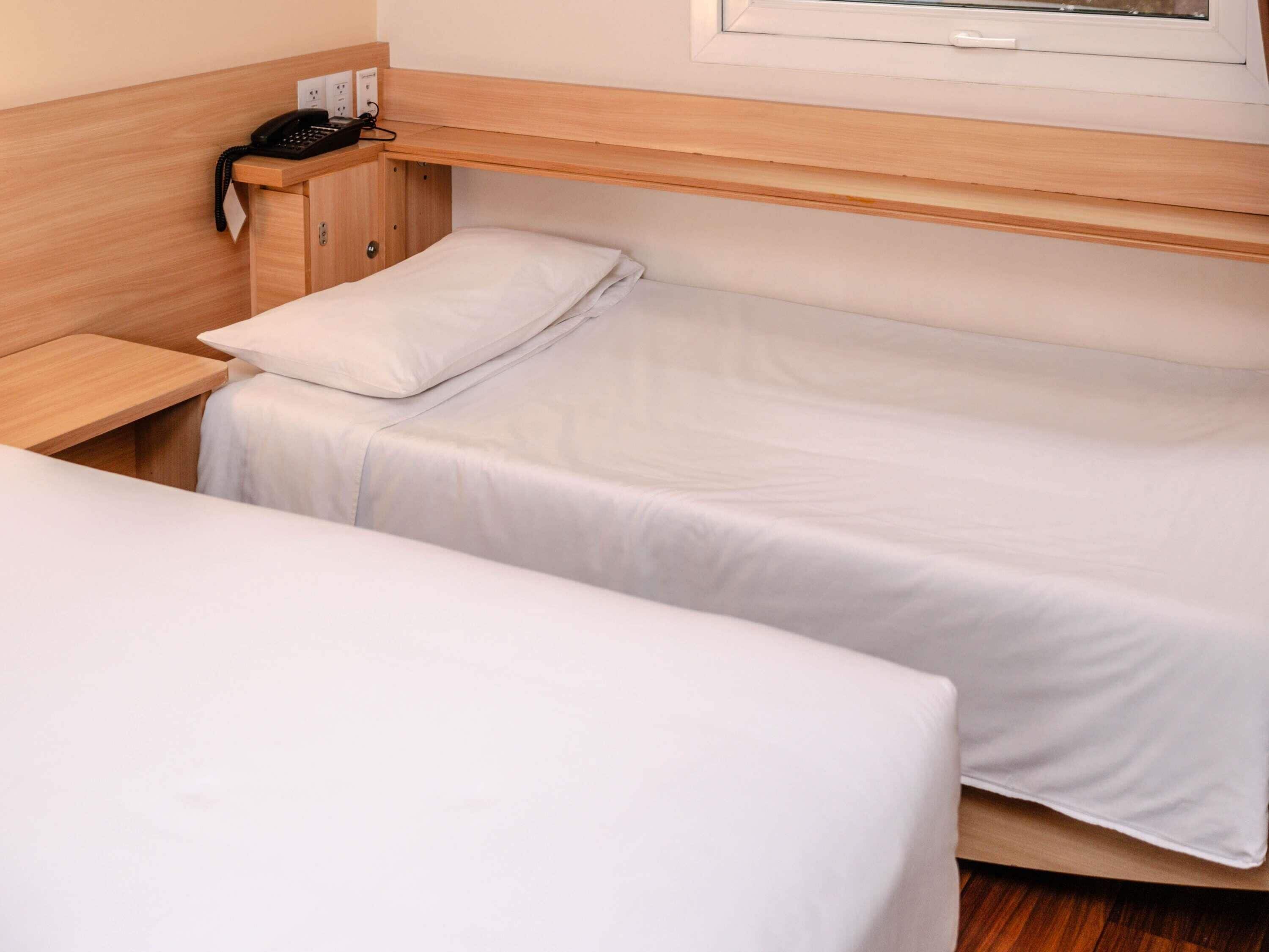 standard room, multiple beds | in-room safe, desk, soundproofing, iron/ironing board