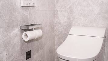 Hair dryer, bathrobes, slippers, towels