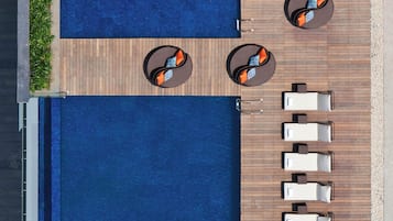 Outdoor pool, open 7:00 AM to 8:00 PM, pool umbrellas, pool loungers