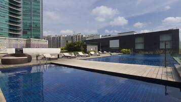 Outdoor pool, open 7:00 AM to 8:00 PM, pool umbrellas, pool loungers