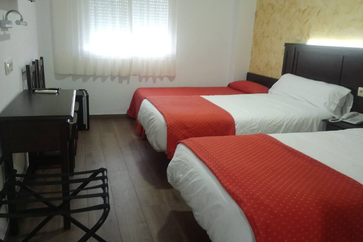 triple room | minibar, in-room safe, desk, blackout curtains