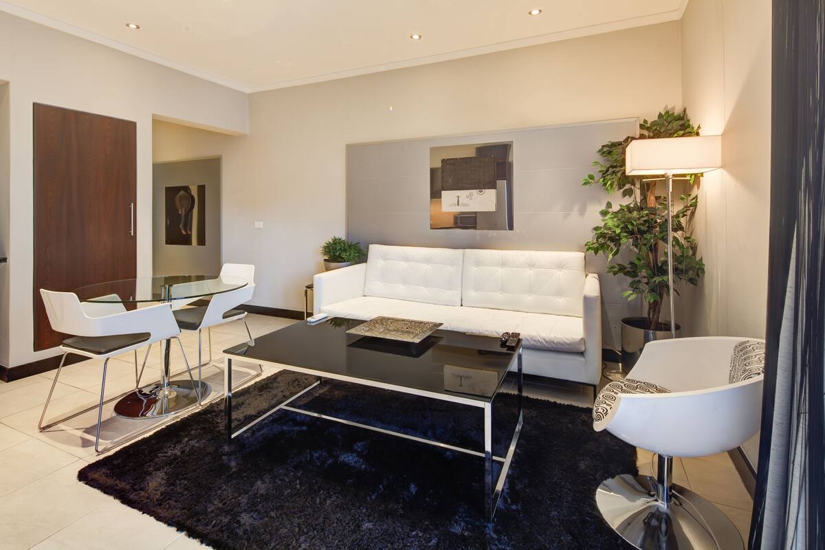 Studio Apartment | Living area | 40-inch plasma TV with satellite channels, TV, DVD player