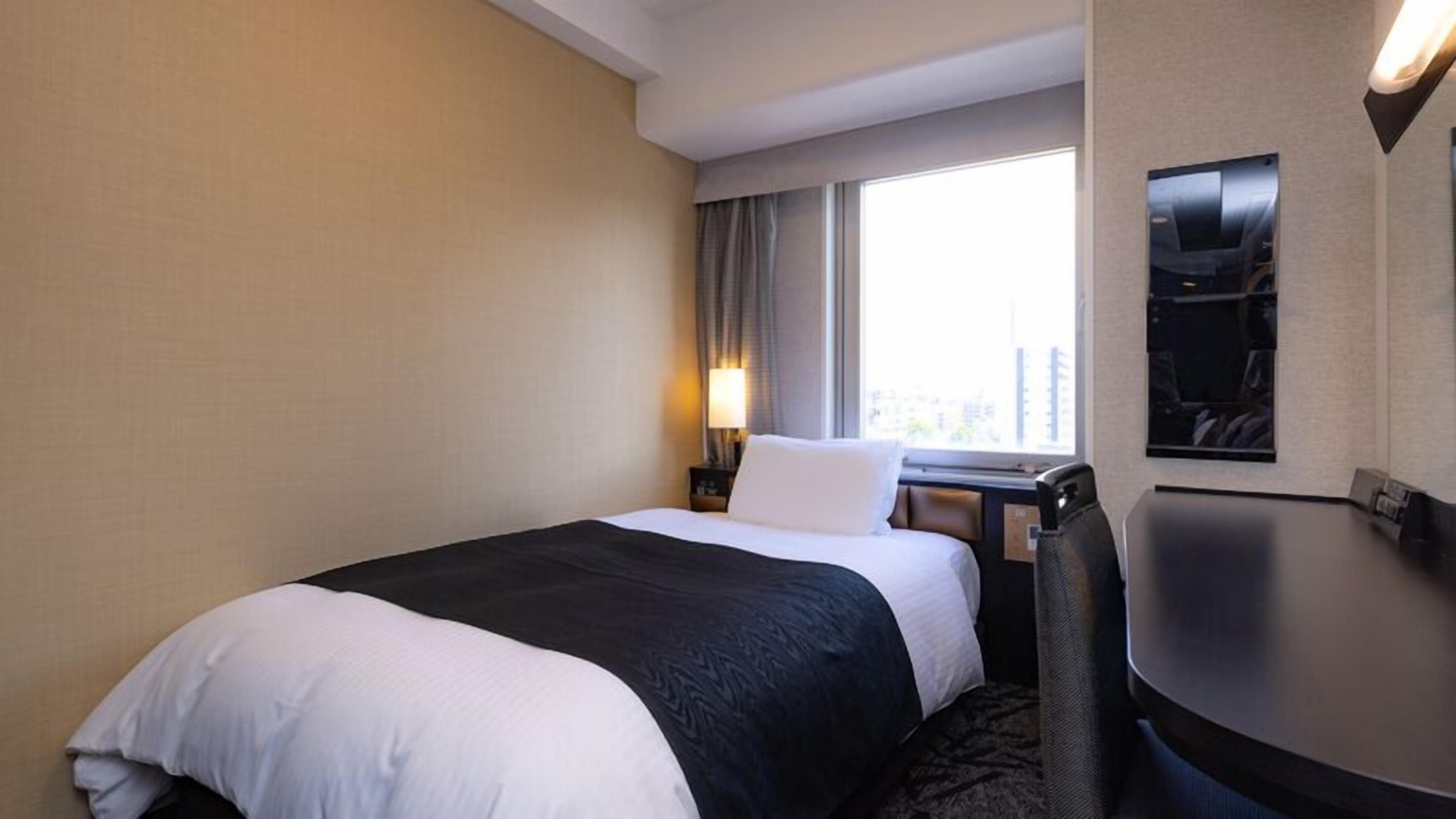Down comforters, desk, blackout drapes, free WiFi