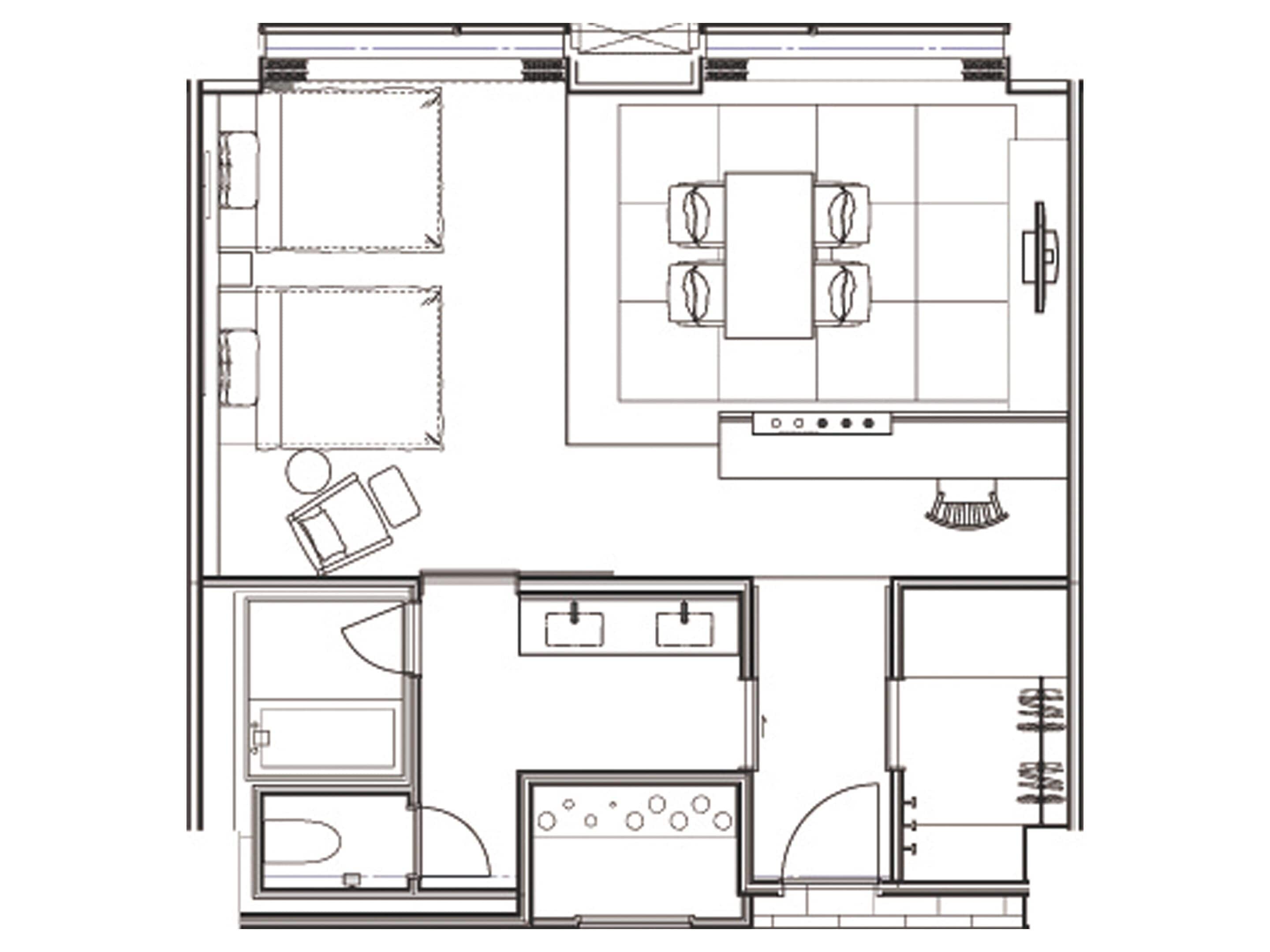 A floor plan of a hotel room with a kitchenette, a bathroom, a living area with a sofa and a dining table, and a separate bedroom area.