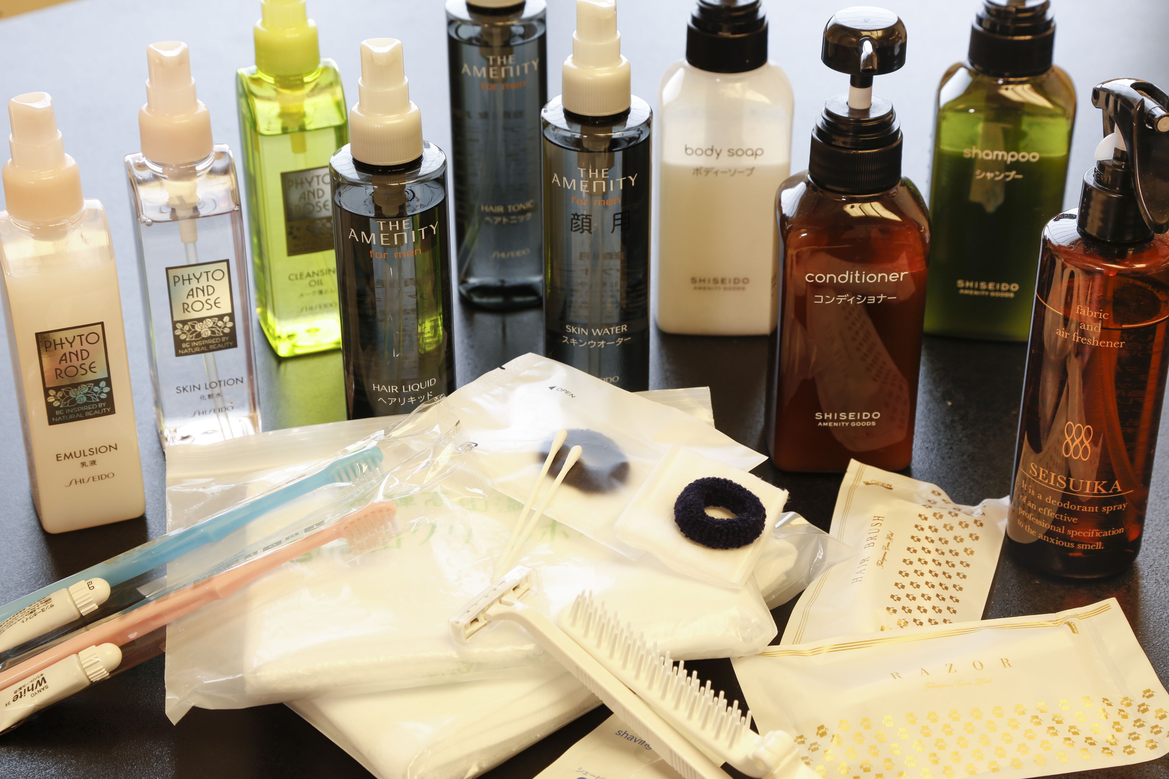 A variety of personal care products including lotions, shampoos, and body soap.