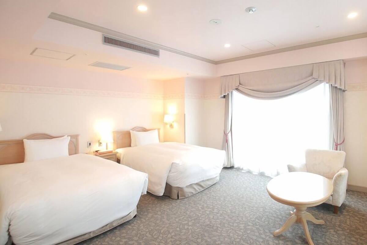 Premium bedding, down comforters, desk, iron/ironing board (on request)