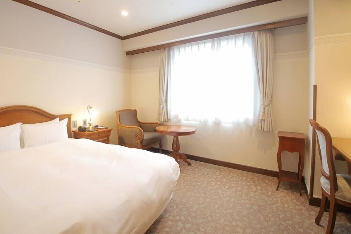Premium bedding, down comforters, desk, iron/ironing board (on request)