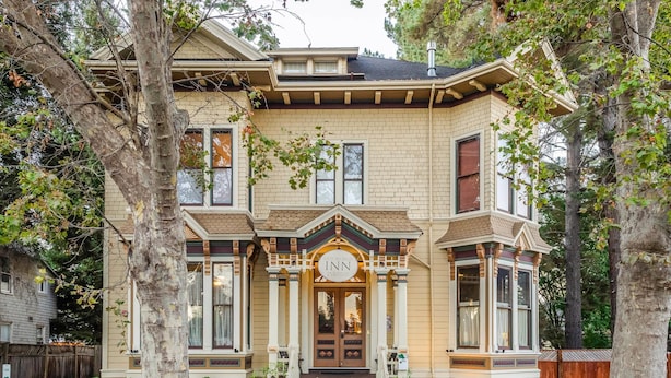 A Victorian-style building with a prominent entrance, large windows, and a well-maintained front yard. - Hotel Napa Valley, an Ascend Collection Hotel (Napa)