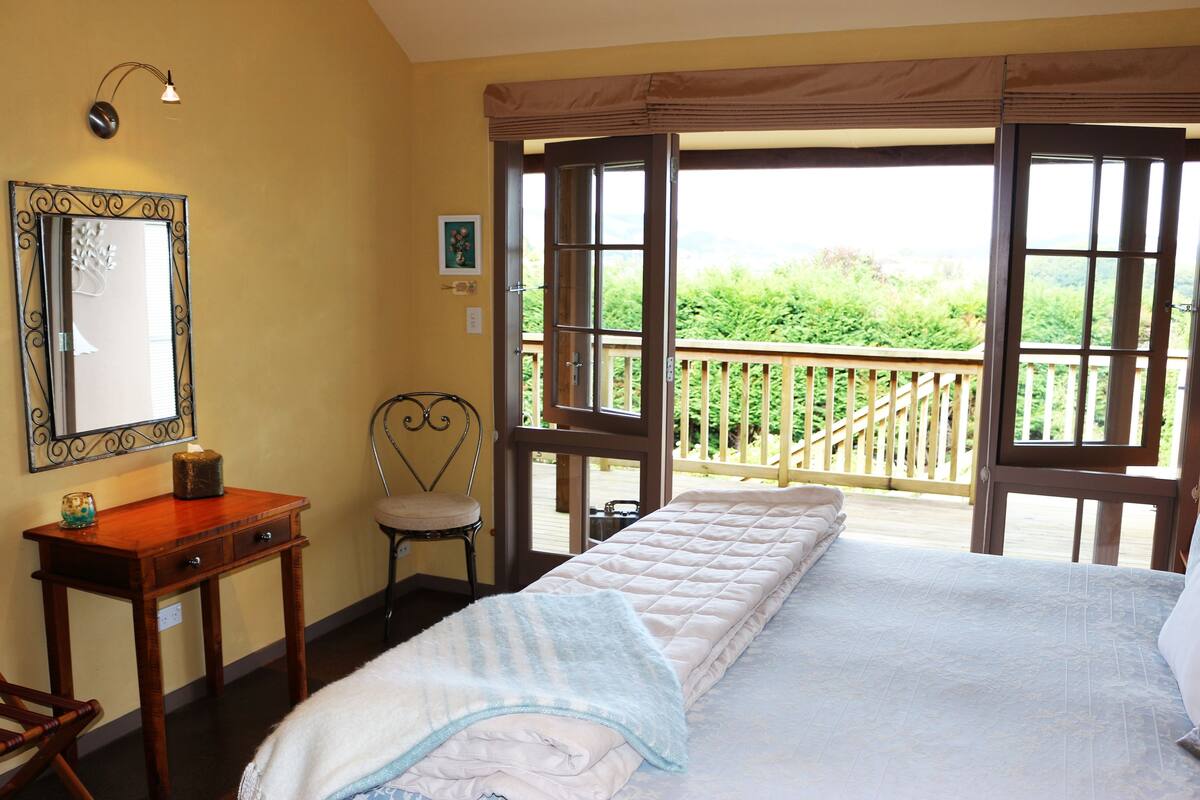 Premium bedding, laptop workspace, blackout curtains, iron/ironing board