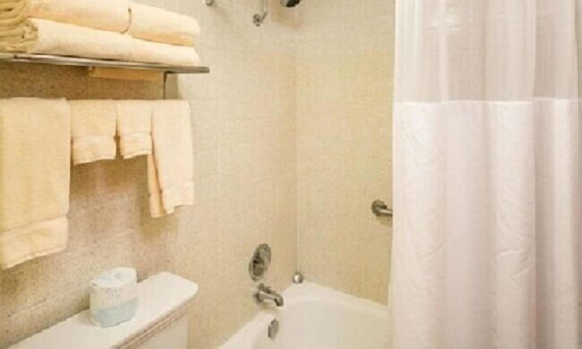 Bathroom | Bathtub, hair dryer, towels