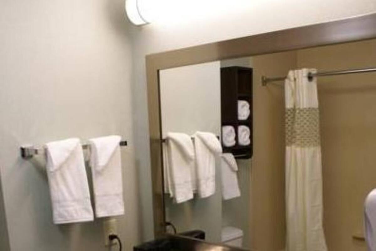 Bathroom | Bathtub, hair dryer, towels