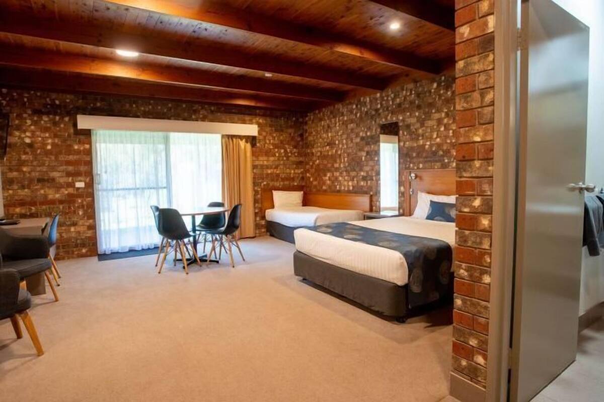 Premium bedding, desk, blackout drapes, iron/ironing board