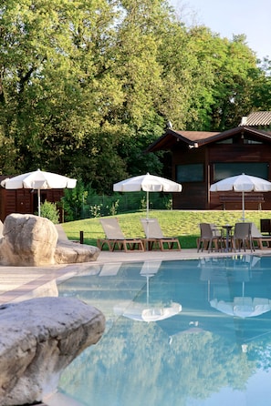 Outdoor pool, pool umbrellas, pool loungers