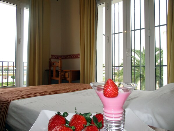 Habitación doble | Caja de seguridad en la habitación, escritorio y cunas gratuitas