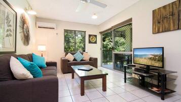 Standard Apartment, 2 Bedrooms, Non Smoking | Living room | LCD TV, DVD player
