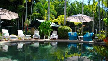 Outdoor pool, pool umbrellas, sun loungers