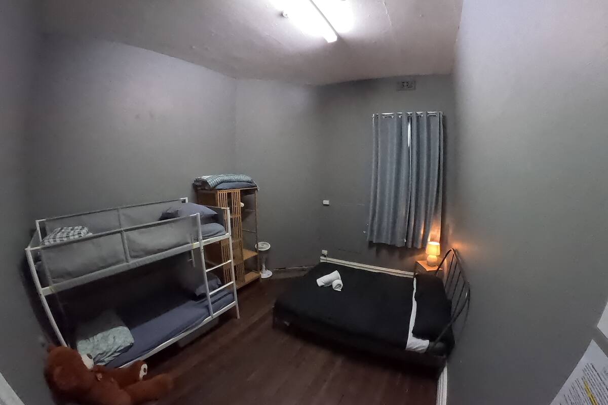 Family Quadruple Room | Blackout drapes, WiFi (free), individually furnished, bed sheets