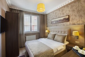 Ropa de cama de alta calidad y minibar 