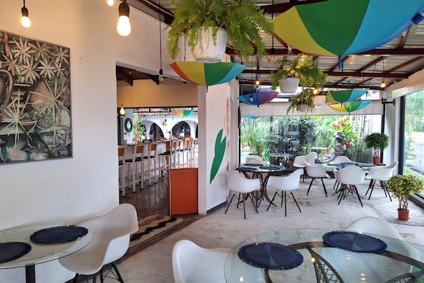 Breakfast, lunch, dinner served; international cuisine, pool views