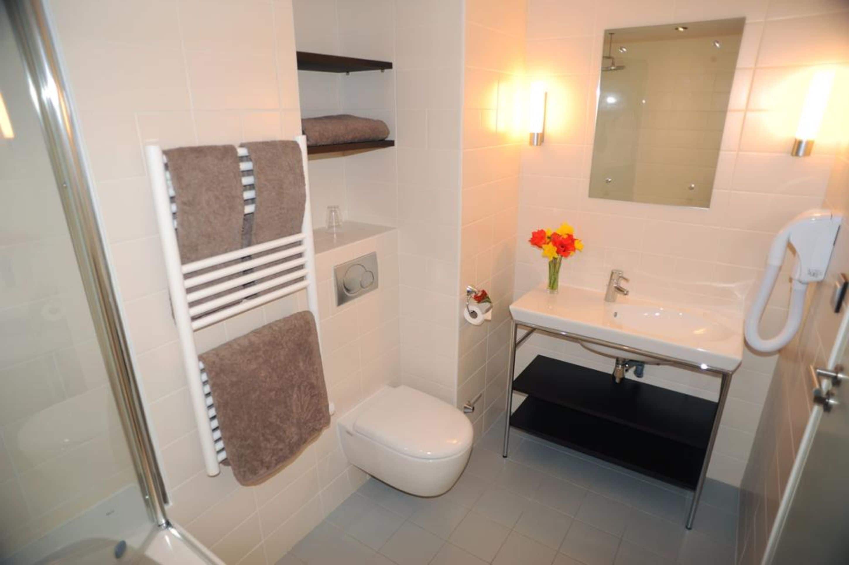superior double room | bathroom | free toiletries, hair dryer, towels