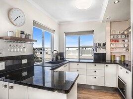 Two Bedroom Superior Rooftop Apartment | Private kitchen | Fridge, microwave, oven, stovetop