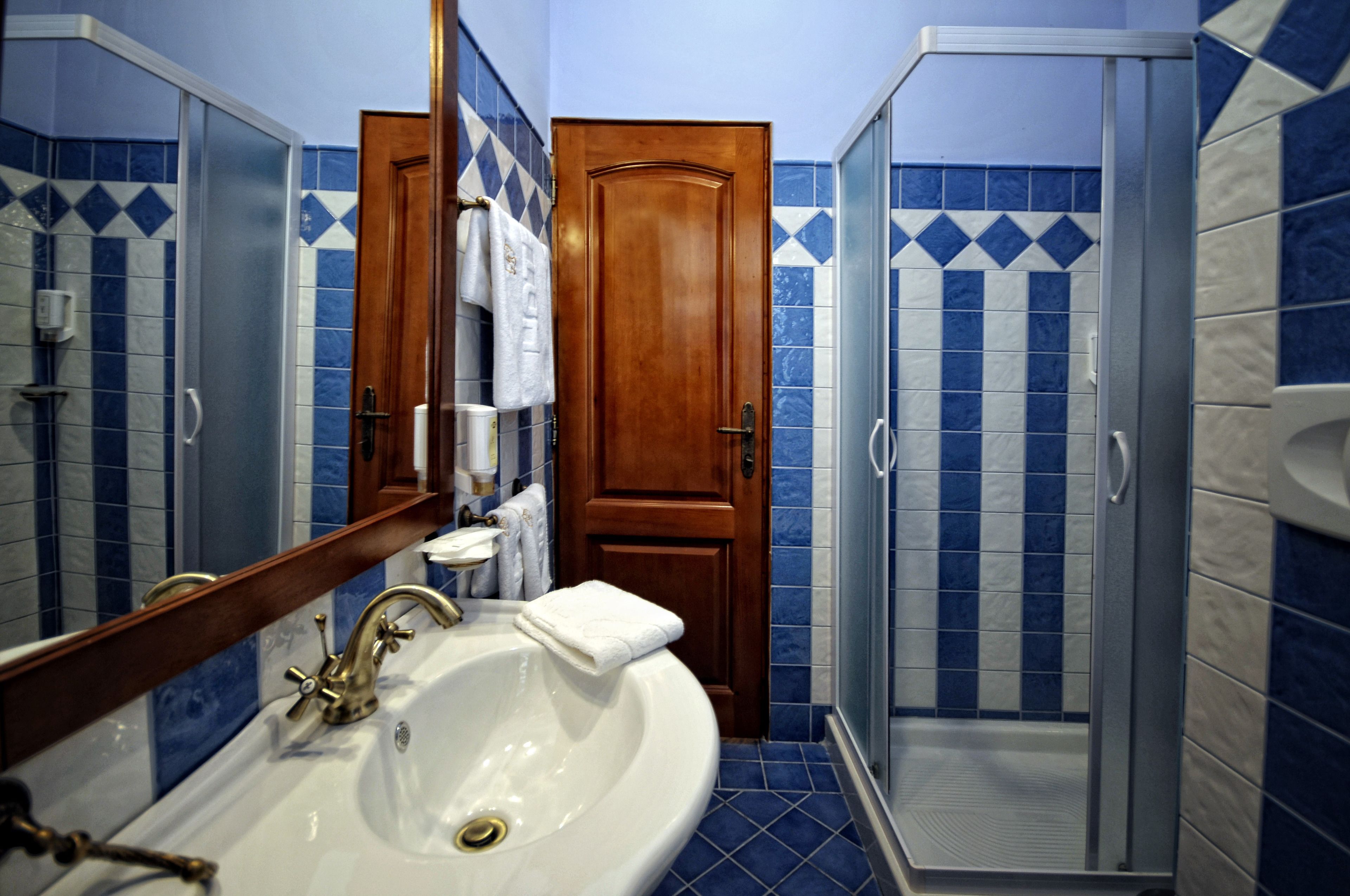 family room | bathroom | shower, hair dryer, slippers, towels